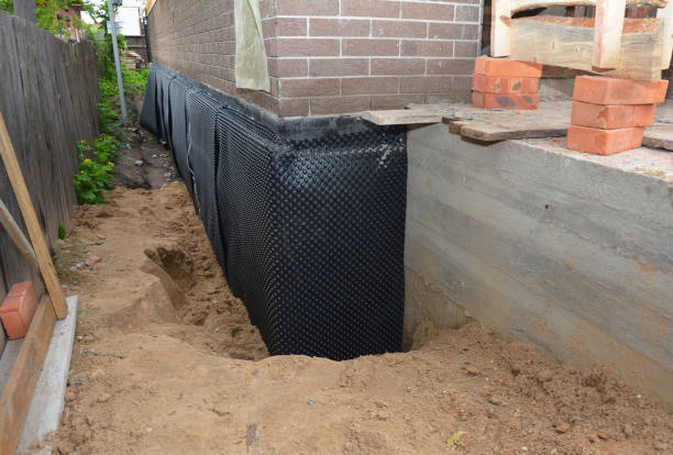 Happy homeowners after waterproofing job in Phoenixville